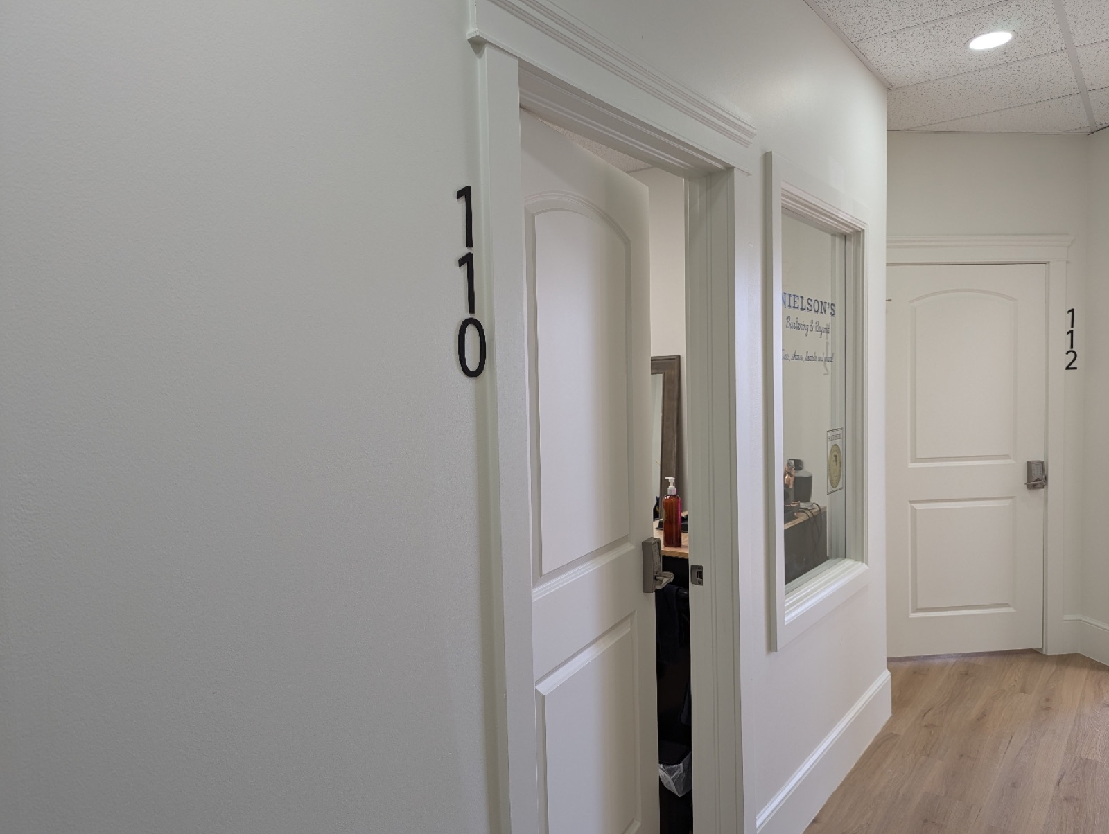 Door to Suite 110